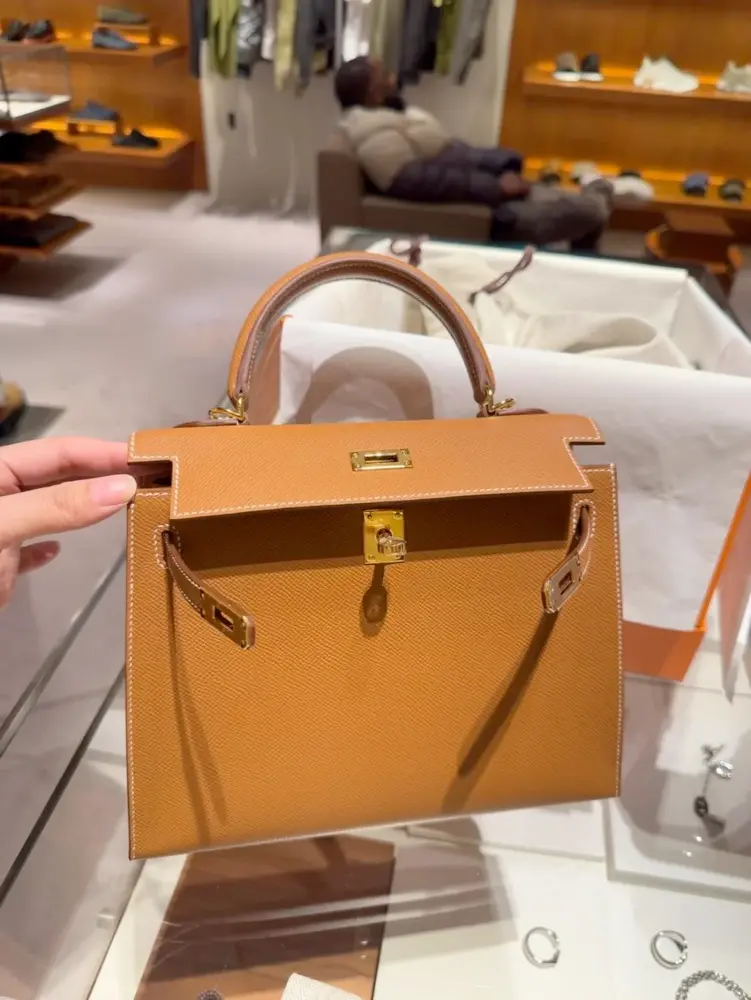 Luxury Presentation of Replica Kelly 25 in Gold Epsom Leather Boutique Style Display of Replica Hermes Kelly 25cm Gold Epsom Bag
