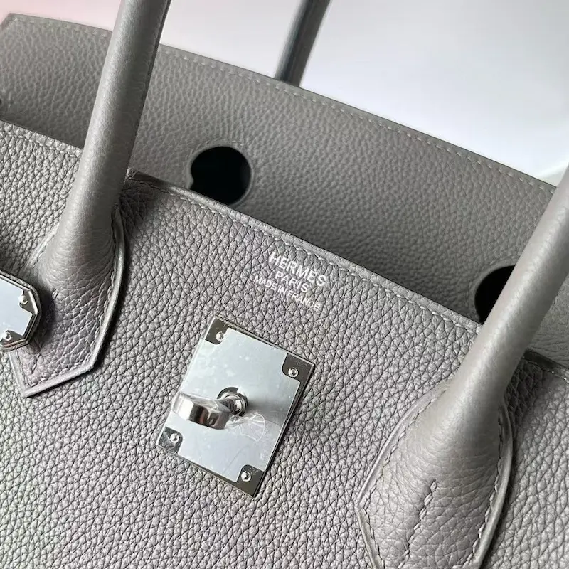 Spot the Difference: Genuine Hermès Stamp on Replica Birkin 30cm Close-up of authentic-depth Hermès Paris stamp on replica Birkin bag