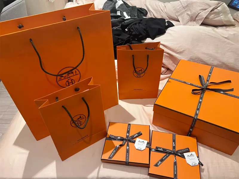 Luxury Unboxing: Replica Hermes Kelly 32cm Packaging Experience Authentic-style Hermes orange box and shopping bag for replica Kelly 32cm delivery