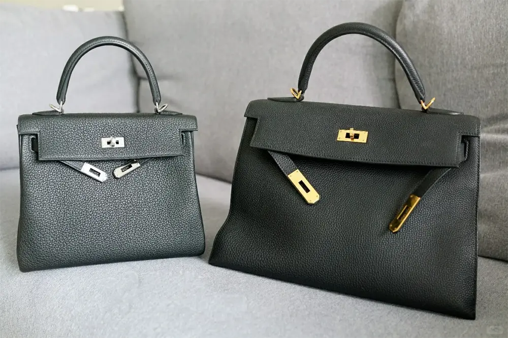 Black Togo Leather Kelly Replica Size Guide: 25cm vs 32cm Replica Hermes Kelly 25cm vs 32cm size comparison in Black Togo leather with Silver Hardware