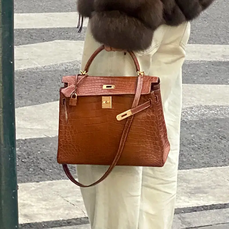Brown Crocodile Replica Kelly 32cm: Ultimate Luxury Look Luxury replica Hermes Kelly 32cm Crocodile leather handbag carried in street style