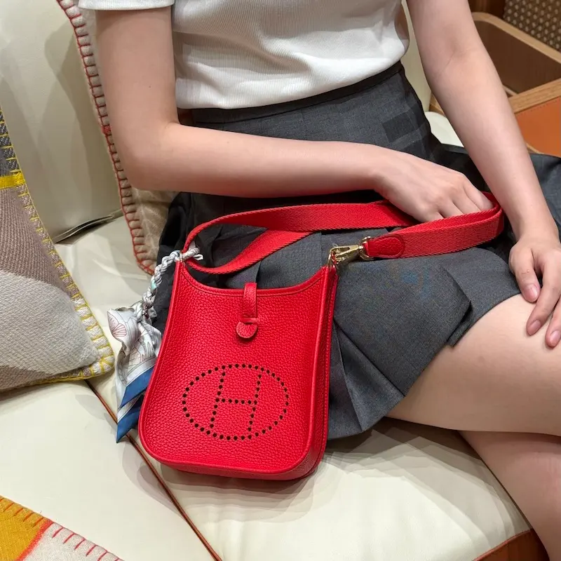 Bold Rouge H Hermes Evelyne Replica First Look Vibrant red Hermes Evelyne TPM replica bag unboxing with orange box