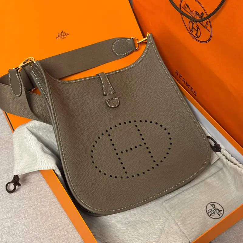 Etoupe Grey Evelyne Replica Details Unboxed Etoupe grey replica Hermes Evelyne 29 showing interior details and strap