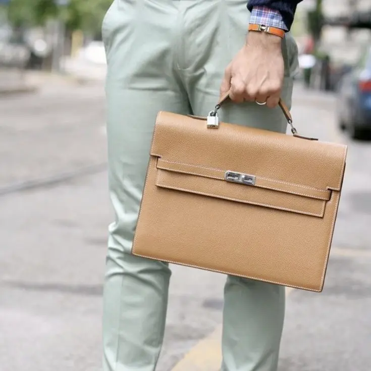 Replica Hermes Kelly Briefcase in Gold - Luxury Work Bag Woman carrying Replica Hermes Kelly Briefcase in Gold Brown calfskin leather