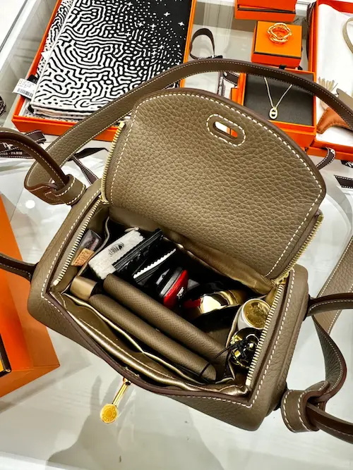 What fits inside a Lindy 19 replica bag Replica Lindy 19 interior capacity holding sunglasses, wallet and daily essentials