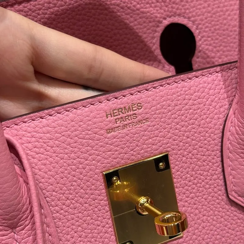 Identify Fake Birkins: Authentic Logo Stamp Depth and Font Analysis How To Spot A Fake Birkin Bag: Close-up of Genuine Hermes Logo Embossing Stamp