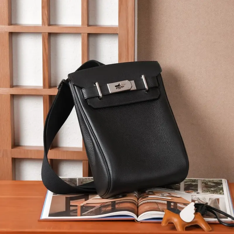 Authentic-Looking Black Hermes Replica Bag Classic black Replica Hermes HAC à Dos bag front view highlighting hardware
