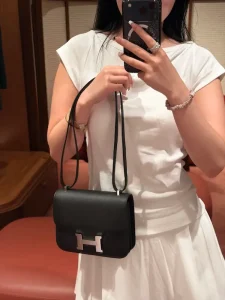 Black Epsom leather Constance bag daily outfit match