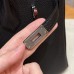Top view of the handle and its silver base hardware on the best replica Hermes black Birkin 25.