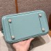 High-quality grained leather texture of the best replica Hermes Blue Atoll Birkin 25 bag.