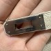 Top view of the handle and its silver base hardware on the best replica Hermes craie Birkin 25.