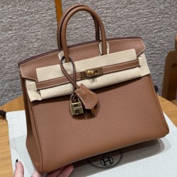 Best replica Hermes gold Birkin 25 with pristine silver hardware on the front clasp