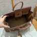 Interior view and craftsmanship stamp inside the best replica Hermes gold Birkin 25.
