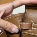Precise replica of the Hermes silver-tone padlock and keys for the best replica gold Birkin 25.