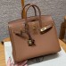 Perfect pearling detail around the silver hardware on this best replica Hermes gold Birkin 25.