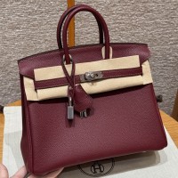 Best replica Hermes Rouge H Birkin 25 with pristine silver hardware on the front clasp