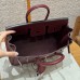 Interior view and craftsmanship stamp inside the best replica Hermes Rouge H Birkin 25.
