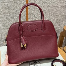 Replica Hermes Bolide 31 Bag - Rouge H Togo Leather Front View Replica Hermes Bolide 31 Bag in Rouge H Togo leather with zip-top closure.