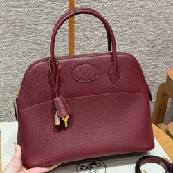 Replica Hermes Bolide 31 Bag in Rouge H Togo leather with zip-top closure.
