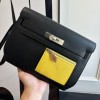 Hermes Kelly Depeches 25 Pouch in Black / Naples Yellow Evercolor Leather