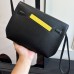 Hermes Kelly Depeches 25 Pouch in Black / Naples Yellow Evercolor Leather Hermes Kelly Depeches 25 Pouch in Black / Naples Yellow Evercolor Leather