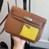 Hermes Kelly Depeches 25 Pouch in Gold / Naples Yellow Evercolor Leather