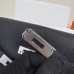  Close-up of the signature turn-lock closure on the replica Hermes Kelly Messenger Bag.