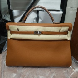 Replica Hermes Voyage Kelly 50 Gold Togo Replica Hermes Voyage Kelly 50 Gold Togo PHW travel bag