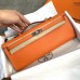 Hermes Kelly Cut Clutch in Orange Epsom Leather Hermes Kelly Cut Clutch in Orange Epsom Leather