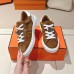 Hermes-inspired side logo on Replica Day Sneaker