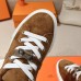 Stitched toe cap detail on Hermes-inspired sneaker